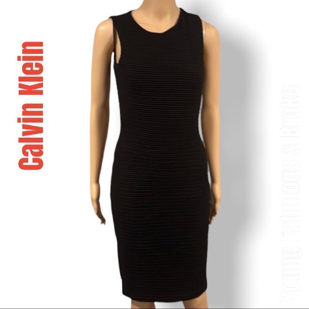 Calvin Klein black form fitting patterned dress, fully lined size small petite